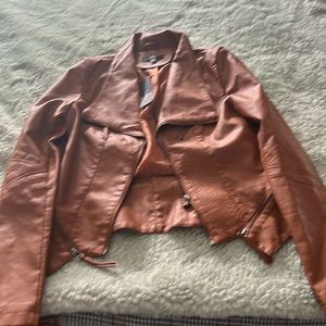 Brown jacket never worn for sale! Perfect for night out on the town.